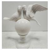 White ceramic doves