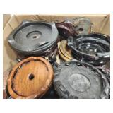 Lot of random coasters and candle holders