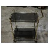 Brass tea cart wi6glass shelves needs cleaning