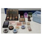 Lot of eye shadows and blush
