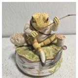 Porcelain frog music box
