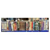 Shelf Lot of DVDs and VHS Tapes