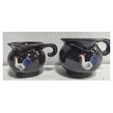 Lot of 2 pottery pourers
