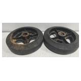 Pair of cast iron and rubber tires