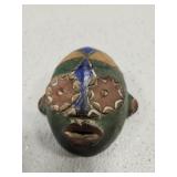 Colorful clay mini African masked wall decor