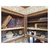 Kitchen cabinet full of trays and more