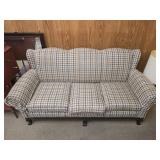 Plaid upholstered couch