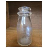 Vintage cold seal dairy bottle