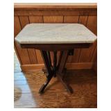 Antique granite top table w wheels wood