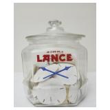 LANCE Cracker jar filled with sand dollars