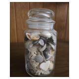Vintage glass jar of sea shells