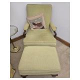 Green upholstered chair and ottoman