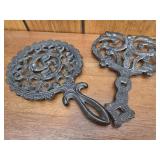 Lot of 2 iron trivets