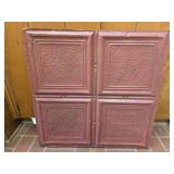 Red painted metal and wood decor