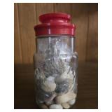 Glass jar full of rocks