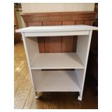 White book shelf with wheels