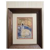 Framed print of a swan