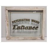 Wood and glass psychiatric entrance sign