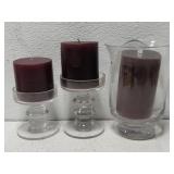 3 candle holders and candles