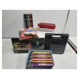 Plastic container filled with art supplies