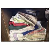 Cabinet lot of misc dish rags and more