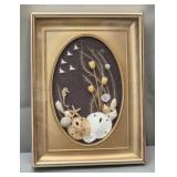 Small framed shadow box of seashells