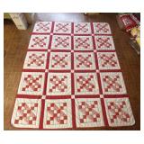 Large red and white quilt