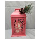 red metal Christmas lantern w a decorative pine