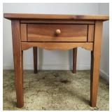 Wooden side table with drawer