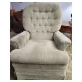 Vintage tan rocking chair in good condition