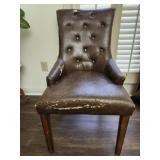 Brown chair w tears