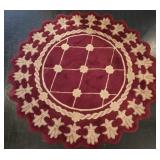 Round Red & Beige Area Rug