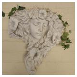 Outside decore of a lady w flowers