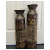 Set of rustic brown metal floor vases with a