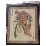 Framed Chinese shadow puppet depicting the