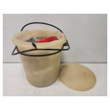 Bucket full of misc cookie cutters and more
