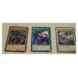 3 misc yu-gi-oh trading cards