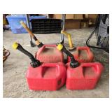 Lot of 4 plastic gas jugs
