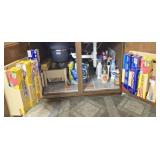 Cabinet Full of Cleaning Supplies Soap Etc