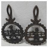 Cast iron Amish themed trivets