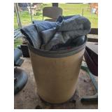 Barrel of moving blankets