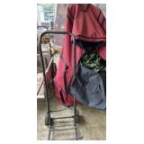 Prelit Christmas tree in storage bag and dolly