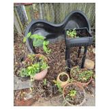 Lot of planters and pond mold  AS IS