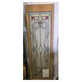 Framed colored glass window