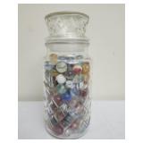 Glass jar of vintage marbles