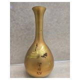Gold colored asian style vase