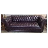Burgundy deep button and brass nail head sofa