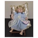 Vintage porcelain Evelyn baby doll and chair