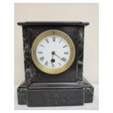 Antique Victorian-era mantel clock typically