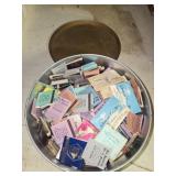 Metal container full of vintage matches